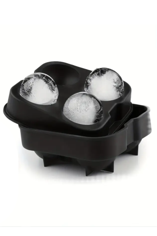 Shaon ice tray that makes hockey puck and stick shaped ice